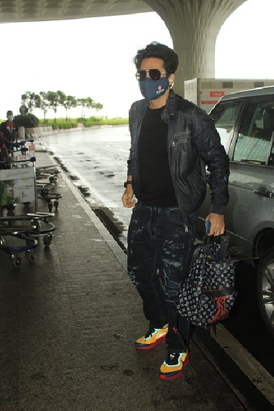 Mumbai: Actor Jackky Bhagnani seen at Chhatrapati Shivaji Maharaj International Airport as he leaves for the UK for the shooting of his upcoming film "Bell Bottom" from Mumbai on Aug 6, 2020. (Photo: IANS)