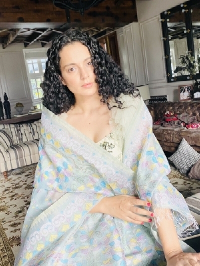 Kangana Ranaut wears Manipuri phanek for a fashion cause. Kangana Ranaut wears Manipuri phanek for a fashion cause.