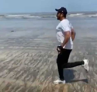 Anil Kapoor turns beach into workout spot.