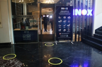 New Delhi: Precautions against COVID-19 in place at the INOX cinema hall in New Delhi on Oct 13, 2020. Cinema halls in the national capital shall reopen from October 15 amid the Covid-19 pandemic as part of Unlock 5.0. (Photo: IANS)