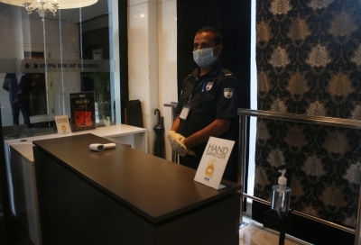 New Delhi: Precautions against COVID-19 in place at the INOX cinema hall in New Delhi on Oct 13, 2020. Cinema halls in the national capital shall reopen from October 15 amid the Covid-19 pandemic as part of Unlock 5.0. (Photo: IANS)