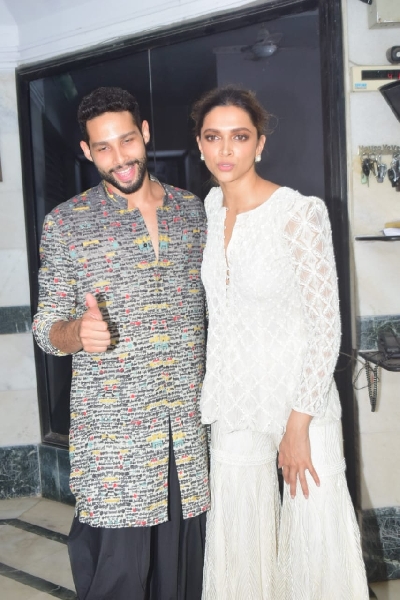 Mumbai: Actors Siddhant Chaturvedi and Deepika Padukone seen at the latter's residence in Mumbai's Juhu on Nov 13, 2020. (Photo: IANS)