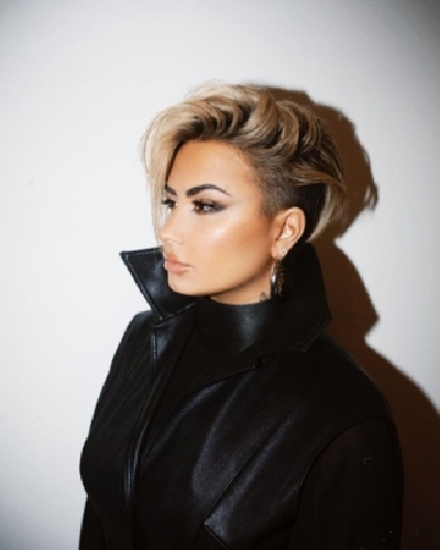 Demi Lovato debuts edgy new pixie haircut. Demi Lovato debuts edgy new pixie haircut.