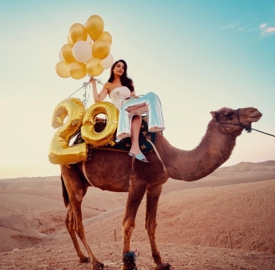 Nora Fatehi rides a camel to celebrate 20 Million Instagram followers.