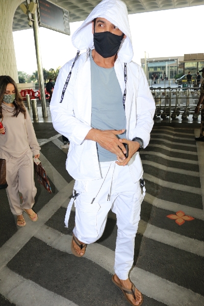 Mumbai: Actor John Abraham seen at the Chhatrapati Shivaji Maharaj International Airport in Mumbai on Dec 23, 2020. (Photo: IANS)