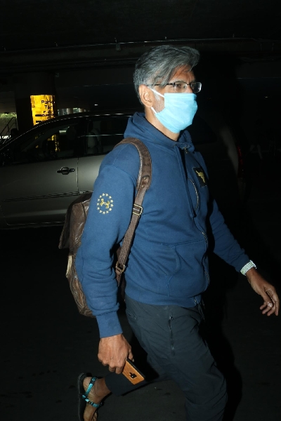 Mumbai: Milind Soman snapped at airport (Photo: IANS)