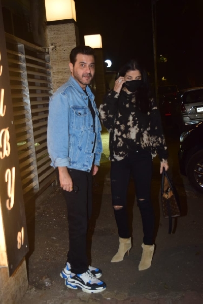 Mumbai: Actor Sanjay Kapoor and his wife Maheep Kapoor see at talent management company, Cornerstone Sport & Entertainment Bunty Sajdeh's Bandra residence in Mumbai on Jan 9, 2021. (Photo: IANS)