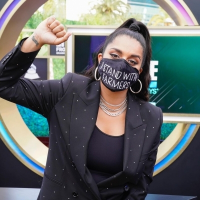 Lily Singh takes Indian farmers protests to Grammy red carpet Lily Singh takes Indian farmers protests to Grammy red carpet