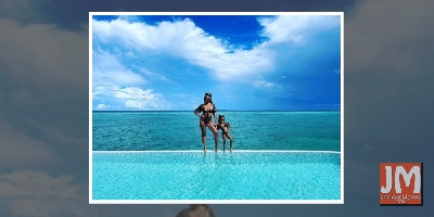 Chrissy Teigen, daughter Luna twin in black bikinis