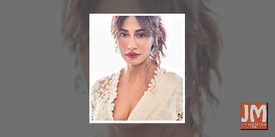 Chitrangda Singh looks stunning in an off-white sari