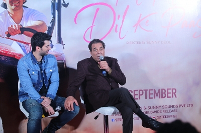 Mumbai: Debutant Karan Deol with his grandfather-actor Dharmendra at the trailer launch of his upcoming film "Pal Pal Dil Ke Paas" in Mumbai, on Sep 5, 2019. (Photo: IANS)