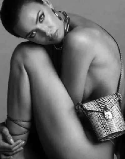 Supermodel Irina Shayk has ditched her clothes and bared it all for a new campaign of a fashion brand. The 33-year-old model went nude in a new campaign to promote Calvin Klein handbags.
