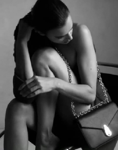 Supermodel Irina Shayk has ditched her clothes and bared it all for a new campaign of a fashion brand. The 33-year-old model went nude in a new campaign to promote Calvin Klein handbags.