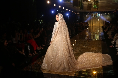 Mumbai: Actress Deepika Padukone showcases a creation of fashion designer Abu Jani-Sandeep Khosla during a fashion show in Mumbai, on Sep 5, 2019. (Photo: IANS)
