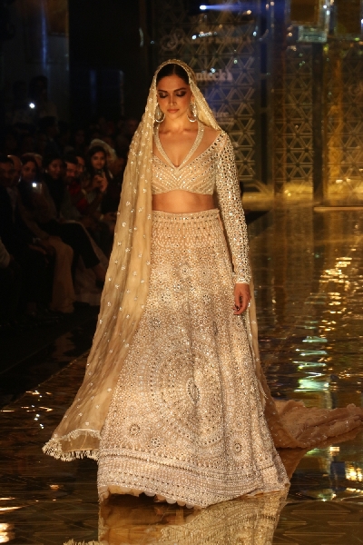 Mumbai: Actress Deepika Padukone showcases a creation of fashion designer Abu Jani-Sandeep Khosla during a fashion show in Mumbai, on Sep 5, 2019. (Photo: IANS)