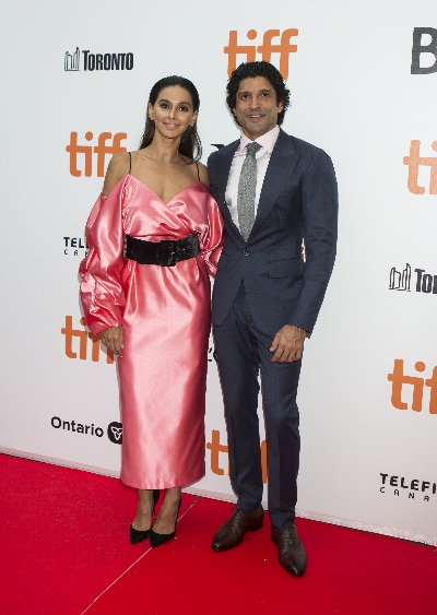 TORONTO, Sept. 13, 2019 (Xinhua) -- Actress Shibani Dandekar and actor Farhan Akhtar pose for photos before the world premiere of the film "The Sky Is Pink" at Roy Thomson Hall during the 2019 Toronto International Film Festival (TIFF) in Toronto, Canada, on Sept. 13, 2019. (Photo by Zou Zheng/Xinhua/IANS)