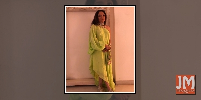 Neena Gupta sports sneakers with neon green outfit