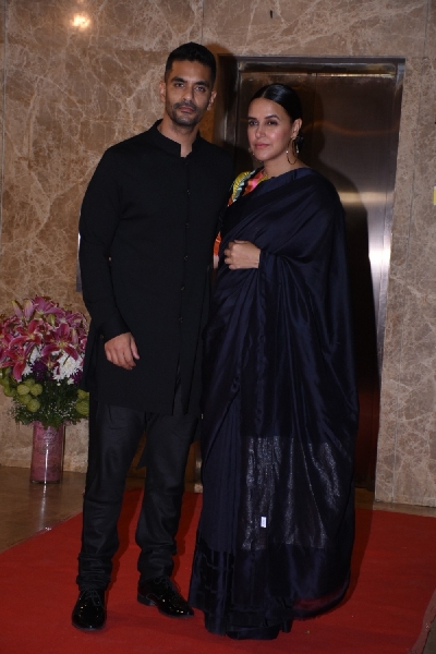 Mumbai: Actors Angad Bedi and Neha Dhupia at filmmaker Ramesh Taurani's Diwali bash in Mumbai on Oct 23, 2019. (Photo: IANS)