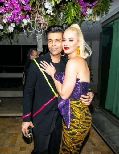 Filmmaker Karan Johar with pop singer Katy Perry at a party hosted by him for her at his residence.