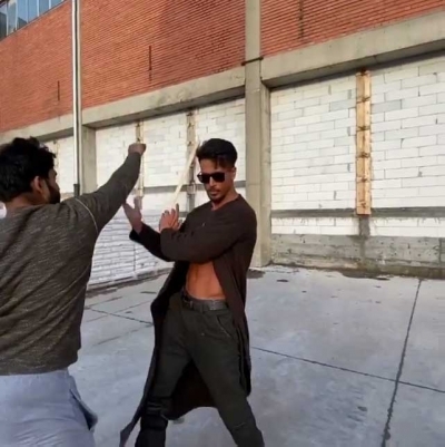 Bollywood action hero Tiger Shroff recreated a scene from the famous film 