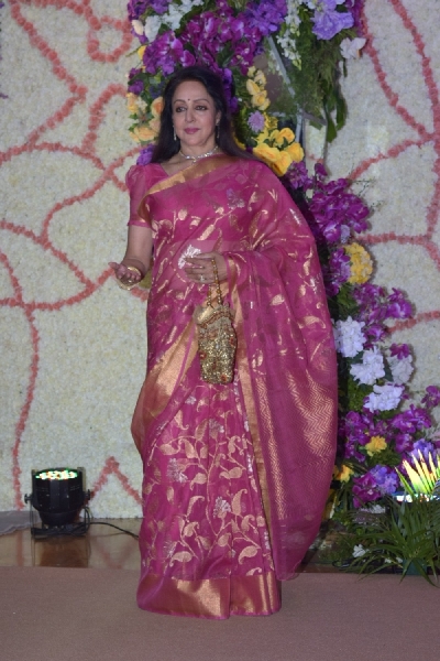 Mumbai: Actress Hema Malini at the wedding reception of filmmaker Sooraj Barjatya's son Devaansh Barjatya in Mumbai on Nov 29, 2019. (Photo: IANS)