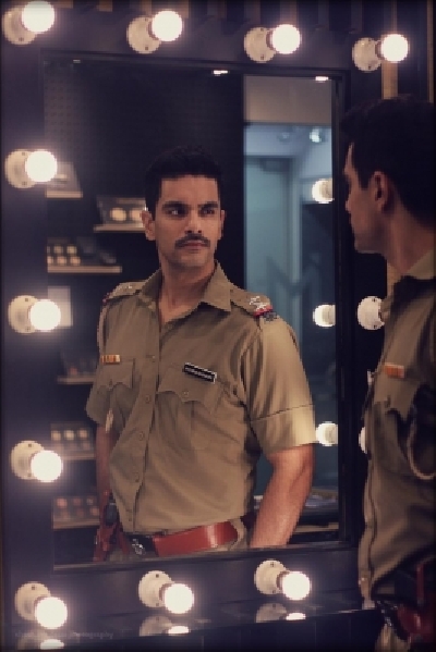 Actor Angad Bedi is not only aiming to get the look of a police officer in upcoming series 