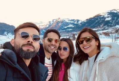 Virat Kohli and Anushka Sharma are in Switzerland these days to usher New Year, and who should they spot painting the town red but Varun Dhawan and his girlfriend Natasha Dalal! Not just Virat and Anuska, Varun also bumped into the Kapoor sisters Karisma and Kareena in Switzerland.